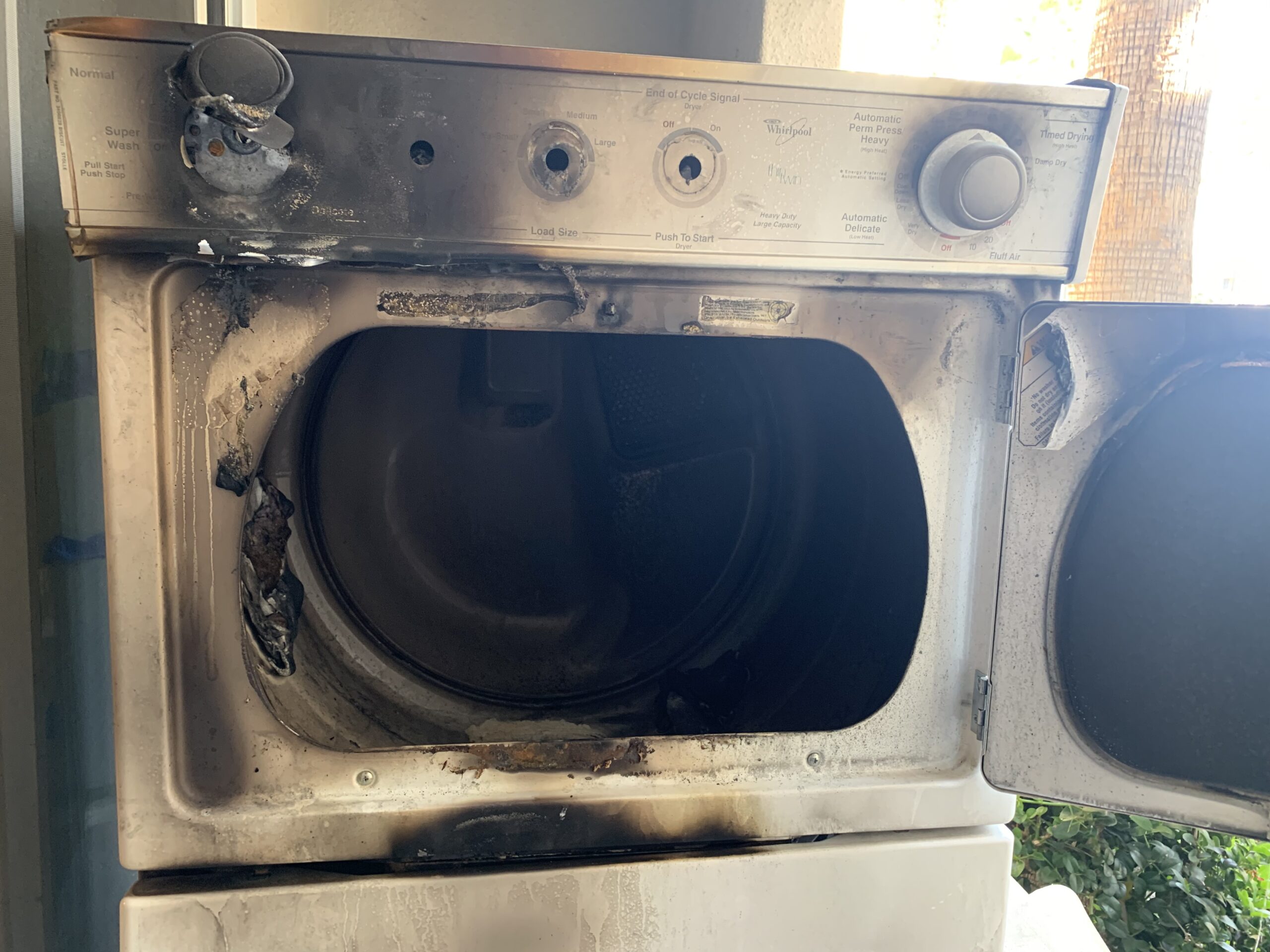 Burnt Dryer caused by the lint trap getting clogged and catching fire